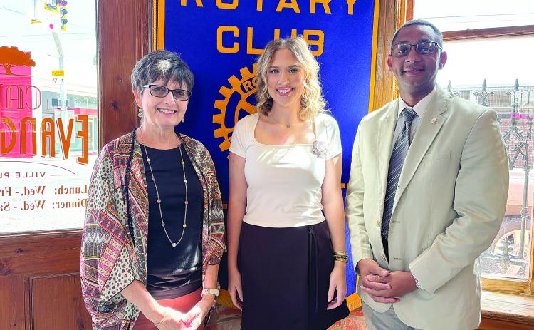 CALHOUN TALKS COTTON FESTIVAL - Katelyn Yates Calhoun (center) was the guest speaker for the October 3, meeting of the Ville Platte Rotary Club. She is shown with Rotarian Annette Johnson (left) and Rotary President Brian Ardoin. (Gazette photo by Heather Bogard)