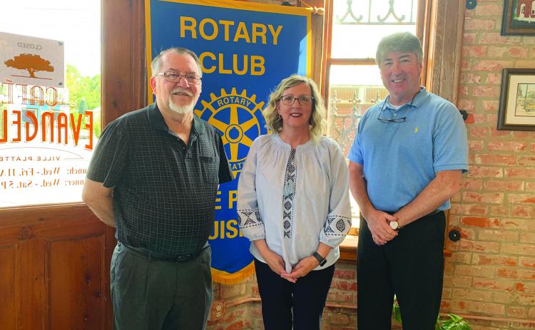 DEEN VISITS WITH VP ROTARY CLUB - Rotarian Dan Poret, left, welcomed Lisa Deen, center, as the guest speaker for the October 12, meeting of the Ville Platte Rotary Club. They are shown with Rotary President Jimmy LeBlanc, right. (Gazette photo by Heather Bogard)