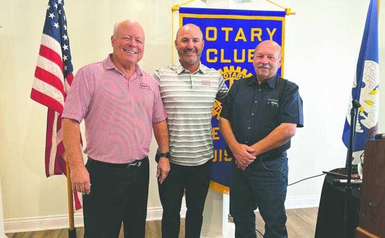 UPDATE PRESENTED ON UL BASEBALL - UL Lafayette Assistant Baseball Coach Seth Thibodeaux visited the October 29, meeting of the Ville Platte Rotary Club. He is shown with Rotarian Dr. Joey Soileau (left) and Rotary President Bob Manuel (right). (Gazette photo by Heather Bogard)