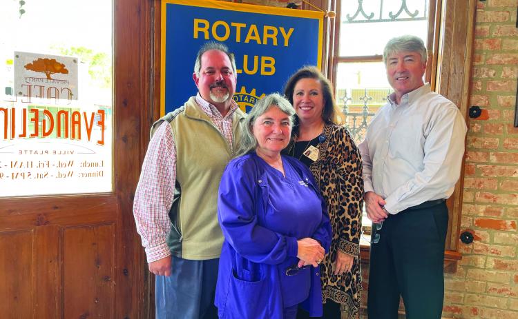 NURSING HOME UPDATE GIVEN - Heritage Manor Administrator and Rotarian Trey Prudhomme, left, was the guest speaker for the November 9, meeting of the Ville Platte Rotary Club. He is shown with, from left, Heritage Manor Activity Director Patricia Duplechin, Rotary Secretary Renee Brown and Rotary President Jimmy LeBlanc. (Gazette photo by Heather Bogard)