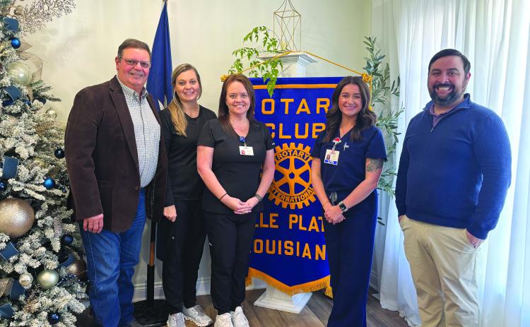 IN-PATIENT REHAB BENEFITS SHARED - Shown, from left, are Rotarian Mitch Fontenot, Sara LaFleur, Tiffany Leger, Kayla Stelly and Rotary President Beau Wilson. (Gazette photo by Heather Bogard)