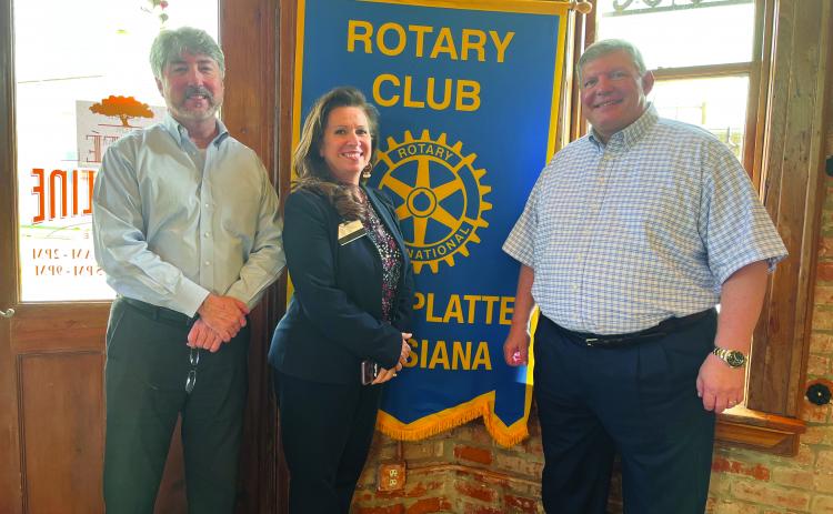  Rotarian Renee Brown (center) addressed her fellow club members during the Dcember 14, meeting of the Ville Platte Rotary Club. She is shown with Rotary President Jimmy LeBlanc, left, and Rotarian Peter Strawitz. (Gazette photo by Heather Bogard)