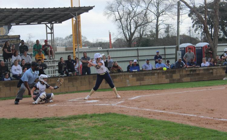 Lady Trojans’ slugger Jolie Vidrine stands ready at the plate in an early season softball game. (Gazette photo by Rhett Manuel)