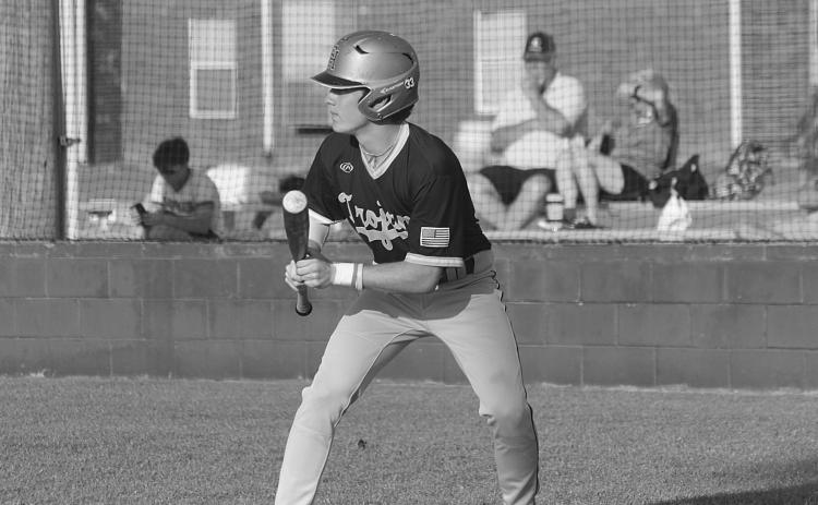 Trojan leadoff hitter and starting shortstop Gabe Wilmouth (11) attempts to lay down a bunt in Thursday’s loss to Kinder. (Gazette photo by Rhett Manuel)